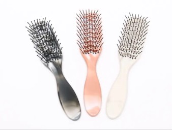 Hvordan bruger man Plastic Hair Comb?